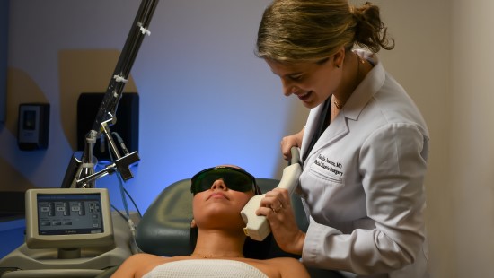 Patient getting a laser treatment on their face